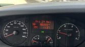 Car dashboard close-up: left speedometer (km/h), right tachometer (rpm), center red LED display shows date 'Vri 29 Mei', odometer 180,222 km, outside temp 39°C, trip 1137 km. There are fuel and temperature gauges below.