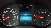 Car dashboard with speedometer left and tachometer right; center screen shows gear in Park (P), outside temperature 17.0°C, time 10:15, trip 9.5 km and estimated range 340 km, plus a fuel warning indicator.