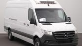 White Mercedes-Benz cargo van (Sprinter) viewed from the front-right, with a roof-mounted cooling unit on top and black bumper.