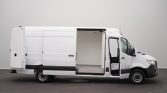 White cargo van shown in profile with the side sliding door open to reveal an empty cargo area inside.