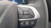 Steering wheel cruise-control cluster: SET+, SET−, RES, CANCEL, and central cruise button.
