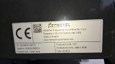 CE label on a black surface with Henschel Engineering Automotive details (address, serial, product type, dimensions 2690×2030 mm, date 40/2024).