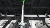 Vertical hydraulic cylinder mounted to a heavy-duty trailer frame. Must be lifted by a jack system? (informative)