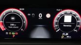 Car dashboard: digital instrument cluster showing 0 km/h, 208 km total distance, 'Veronica' on right gauge, time 20:59, temp 16.5°C, fuel range 80 km, parking indicator lit.