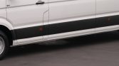 White cargo van side view with black lower panel and running board, front wheel visible on left.