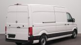 White cargo van shown from the rear and side, with long body, sliding side panel, and dual rear doors (VW Crafter style).