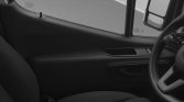 Right-hand-drive vehicle interior: steering wheel, door panel, and front seats visible in the cabin view.