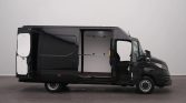 Black cargo van with side door open, showing a blank white cargo interior and driver seat area ready for loading.