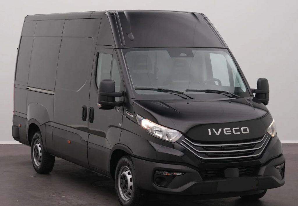Dark gray Iveco cargo van from a front-three-quarter view, showcasing large high-roof cargo area and side panel doors