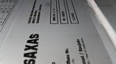 Close-up of a metal identification plate on equipment, with large 'SAVAS' branding and boxes labeled for model, number, and date in German (rotated).