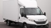 White Iveco delivery box truck with a large cargo box and Cab-over-engine design, facing slightly right in a studio setting.