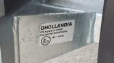 Metal trailer frame with a certification sticker reading DHOLLANDIA and ECE approval for underrun protection (58R-033124)