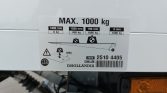 White load-label on a vehicle showing MAX 1000 kg and a load-distribution diagram.