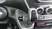 Automatic gear shifter in Park with P R N D M modes visible on the console.