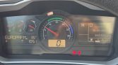 Car dashboard instrument cluster showing speedometer, tachometer, and digital readouts; current speed 0 km/h, date 30/05/2026, warning icons visible at bottom.