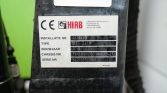 Close-up of a HIAB equipment identification plate showing installation number, type, build year, chassis and serial numbers.