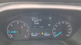 Car dashboard display: fuel level low with 66 km to empty, odometer 70,329.8 km, outside temp 16°C, warning lights on.