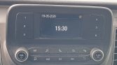 Car radio console showing date 19-05-2026 and time 15:30, with preset buttons (1–3 on left, 4–6 on right) and volume/tune knobs.