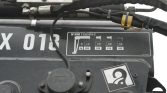 Industrial machine label showing reach vs. weight: 1.2m=995kg, 2.0m=920kg, 3.0m=610kg, 4.2m=430kg (Rexroth).