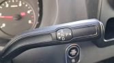 Steering-column gear selector with R N P D indicators on a car dashboard