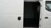 White cargo van with its side sliding door open, revealing an empty dark cargo area.