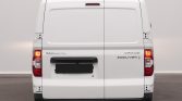 Rear view of a white Maxus Deliver 3 van with double rear doors and red taillights, license plate obscured