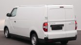 White cargo van shown from the rear three-quarter angle, featuring double rear doors and a black license plate area.