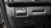 Headlight level adjustment dial on the driver's side dashboard, numbered 0–2