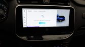 In-car touchscreen infotainment system displaying a Bluetooth connect prompt, with a blue pickup graphic on the right side of the screen.