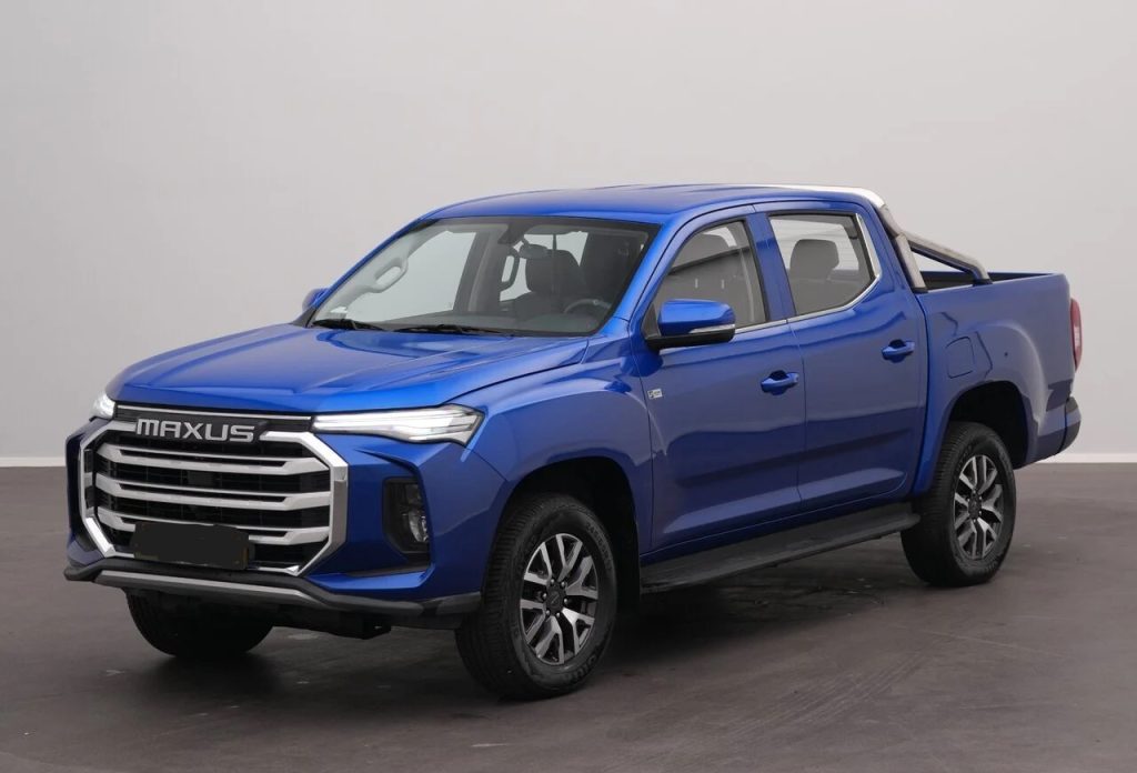 Blue Maxus pickup truck, double-cab, angled three-quarter view showing front grille and chrome accents