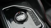 Rotary gear selector on a car center console showing R, N, D with ECO and PWR mode buttons to the right.