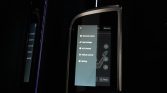 Infotainment screen in a dark car showing a vertical menu with Scenario center, Seat linkage, A/C Control, Vehicle control, Setting.