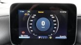 Digital car instrument cluster showing speedometer at 0 km/h, gear in Park, and range indicator (370 km) on the left edge.