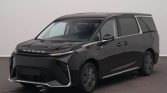 Black Maxus minivan parked indoors, front three-quarter view showing sleek chrome accents and sliding doors