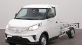 White cab-forward delivery truck with an exposed rear chassis for mounting a bed or body