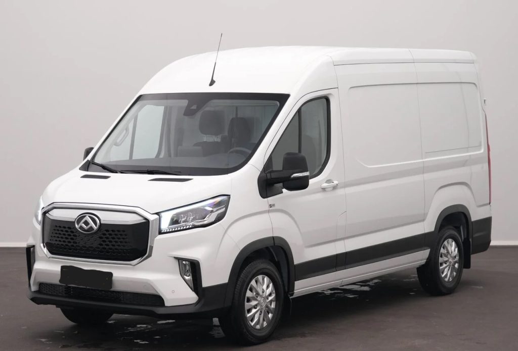 White cargo van in a three-quarter front view, showing high roof and black lower trim.