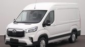 White cargo van in a three-quarter front view, showing high roof and black lower trim.