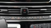 Centre console with hazard light button, HOME button, and drive‑assist switches (AEB, ECO, PWR).