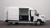 White cargo van with the sliding side door and front cab doors open, revealing an empty cargo area inside.