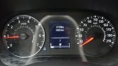 Car instrument cluster with left tachometer, right speedometer, and center display showing total 41,729 km and trip 3,560.0 km.