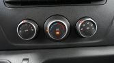 Dashboard climate controls: left dial for fan speed, middle dial with A/C on and temp blue/red gradient, right dial for air distribution icons.