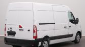 White cargo van with rear double doors and black bumper, viewed from the back-right corner in a neutral studio setting.