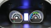 Dashboard instrument cluster: left speedometer (0–160 km/h) with needle near 0, center blank display, right colorful gauge (amperage) with needle, and a green 'READY' indicator below.