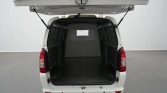 White cargo van with rear hatch open, showing an empty, textured cargo space for storage or transport.