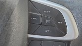 Car steering wheel cruise control buttons: SET+, SET-, CANCEL, RES with central cruise icon