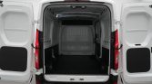 Open rear doors of white cargo van showing an empty loading area ready for storage or transport of goods.
