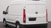 Rear three-quarter view of a white Maxus Deliver cargo van, showing double back doors and taillights against a neutral background