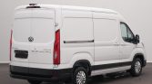 White Maxus Deliver 9 cargo van shown from rear three-quarter view, with dual rear doors and side cargo paneling