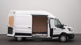 White cargo van with side and rear doors open, revealing an empty plywood-lined cargo area inside a plain studio-like space on a dark floor.