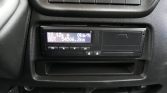Car dashboard center display showing speed 0 km/h and odometer 54,506.2 km registered